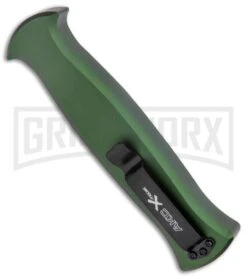 AKC X-treme EVO Green OTF Automatic Knife - Dagger Black Plain 6 AKC X-treme EVO Green OTF Automatic Knife - Dagger Black Plain -Buck Knives Sales Store AKC X treme EVO OTF Auto Dagger Green Black GX 37364 jr side large